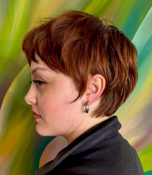 Auburn Pixie with Long Side-Swept Bangs