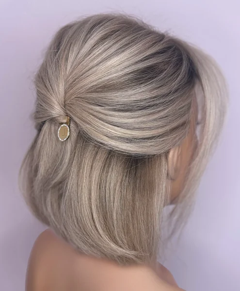 Elegant Half-Up Style with Pearl Clip