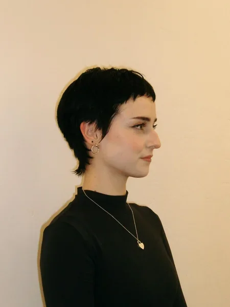Sleek Black Pixie with Blunt Bangs